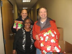 Delivering gifts to families at Hope Clinic 2